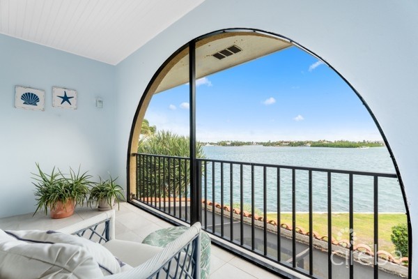 7 MILE BEACH CORRIDOR  3-BED  WATERFRONT TOWNHOUSE ON MAGELLAN QUAY IN GOVERNOR'S HARBOUR