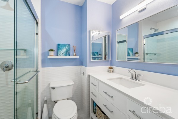 7 MILE BEACH CORRIDOR  3-BED  WATERFRONT TOWNHOUSE ON MAGELLAN QUAY IN GOVERNOR'S HARBOUR