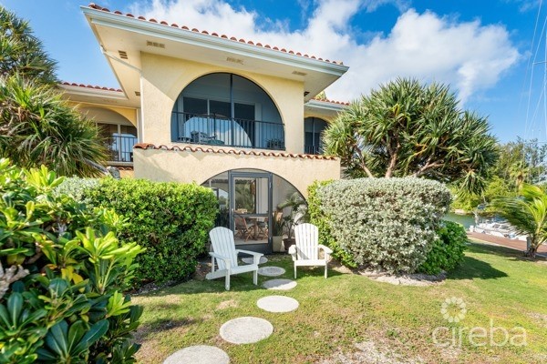 7 MILE BEACH CORRIDOR  3-BED  WATERFRONT TOWNHOUSE ON MAGELLAN QUAY IN GOVERNOR'S HARBOUR