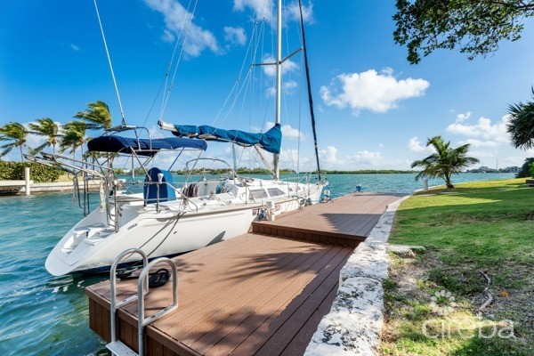 7 MILE BEACH CORRIDOR  3-BED  WATERFRONT TOWNHOUSE ON MAGELLAN QUAY IN GOVERNOR'S HARBOUR