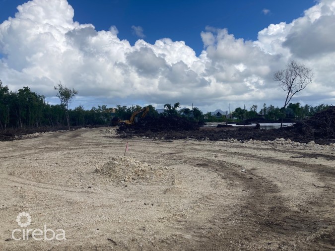 AUBURN BAY, LARGE CANAL FRONT LOT, READY TO BUILD