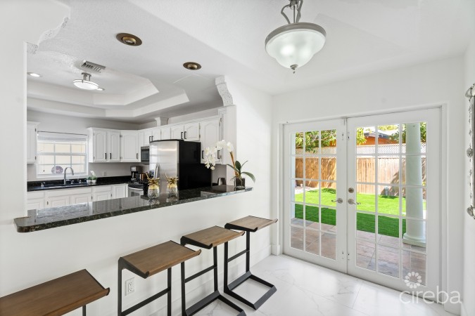 NINE PALMS RESIDENTIAL HOME WITH INCOME PRODUCING COTTAGES