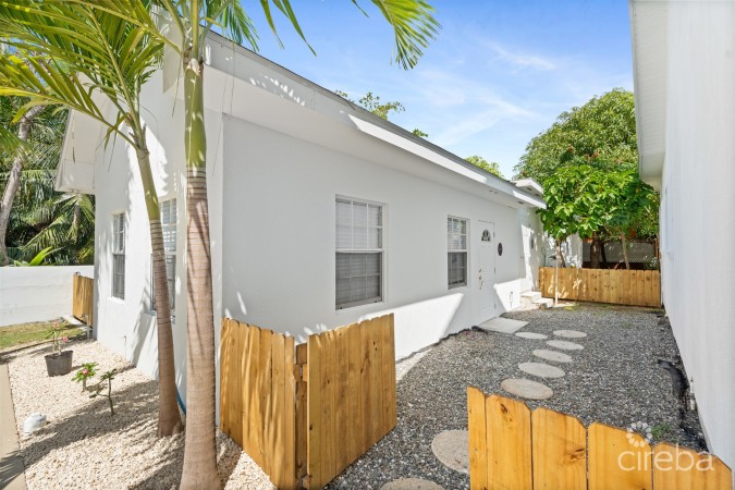 NINE PALMS RESIDENTIAL HOME WITH INCOME PRODUCING COTTAGES