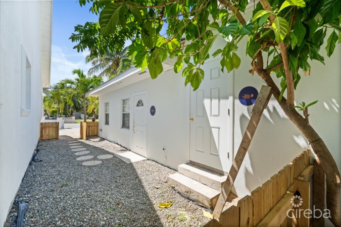 NINE PALMS RESIDENTIAL HOME WITH INCOME PRODUCING COTTAGES