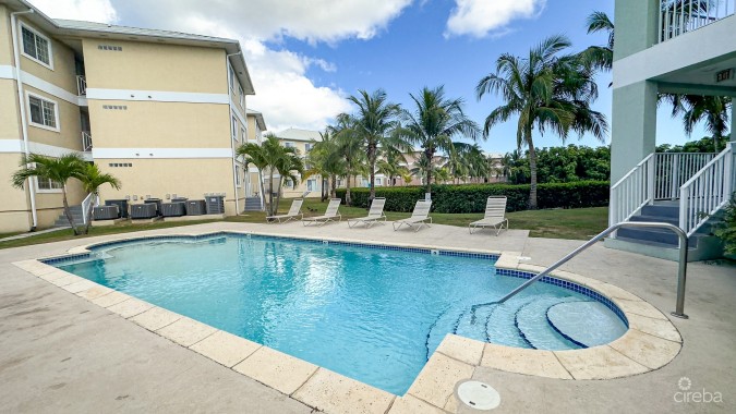 LAKESIDE CONDO NEAR CAMANA BAY