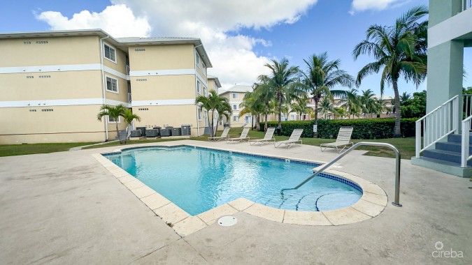 LAKESIDE CONDO NEAR CAMANA BAY