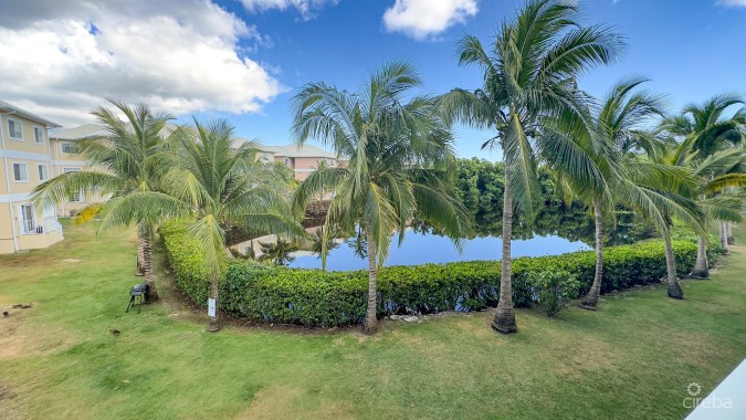 LAKESIDE CONDO NEAR CAMANA BAY