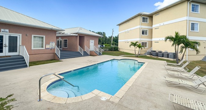 LAKESIDE CONDO NEAR CAMANA BAY