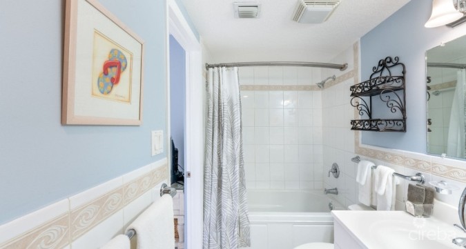 THE HERITAGE CLUB - SEVEN MILE BEACHFRONT CONDO