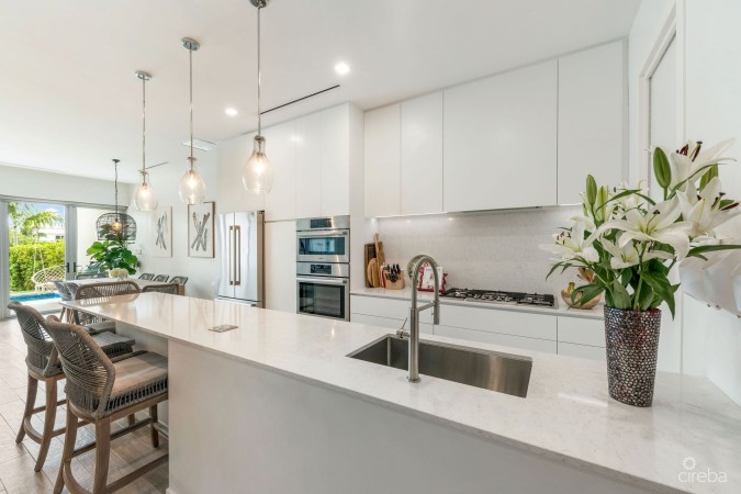 ONE CANAL POINT, UNIT 11 WITH BOAT DOCK