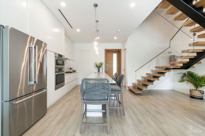 ONE CANAL POINT, UNIT 11 WITH BOAT DOCK