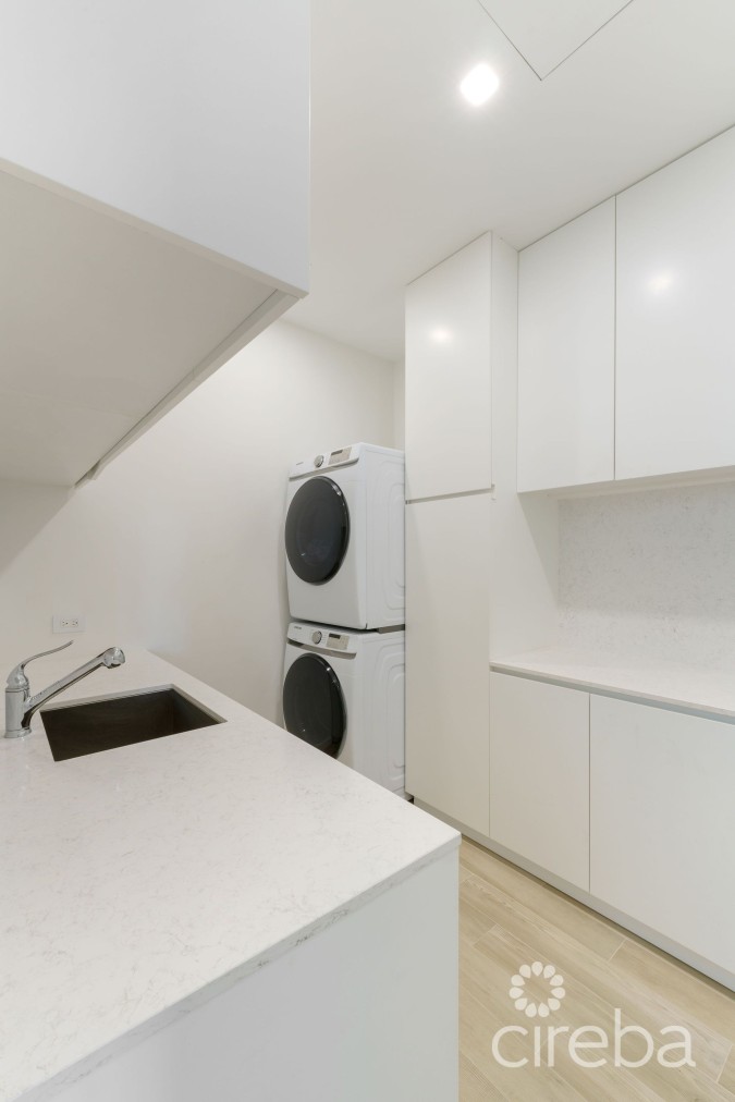 ONE CANAL POINT, UNIT 11 WITH BOAT DOCK