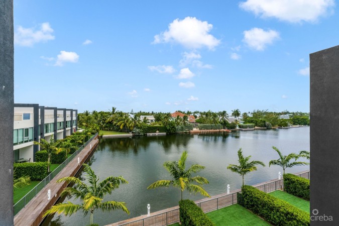 ONE CANAL POINT, UNIT 11 WITH BOAT DOCK