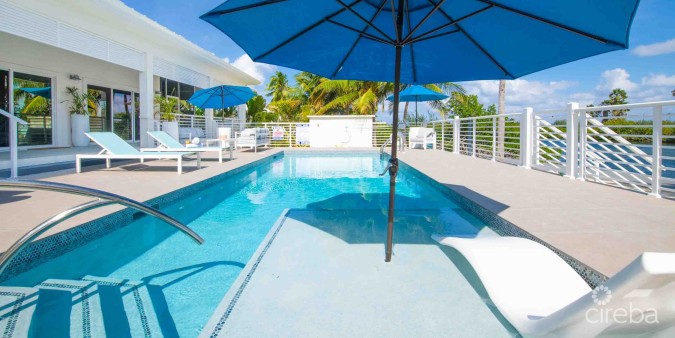 CARIB SUN - EXQUISITE WATERFRONT ESTATE W /GUESTHOUSE IN CAYMAN KAI