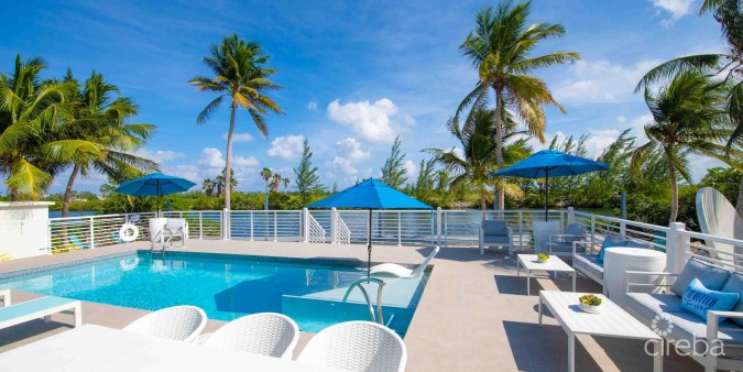 CARIB SUN - EXQUISITE WATERFRONT ESTATE W /GUESTHOUSE IN CAYMAN KAI