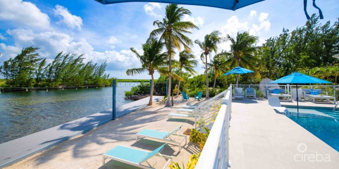 CARIB SUN - EXQUISITE WATERFRONT ESTATE W /GUESTHOUSE IN CAYMAN KAI