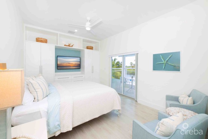 CARIB SUN - EXQUISITE WATERFRONT ESTATE W /GUESTHOUSE IN CAYMAN KAI