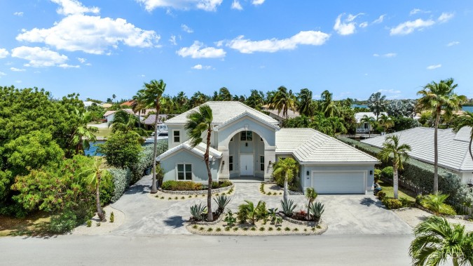 LATITUDE - CANAL FRONT LIVING IN GOVERNOR’S HARBOUR