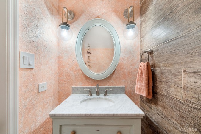 UPGRADED COASTAL ESCAPE CANAL FRONT TOWNHOUSE