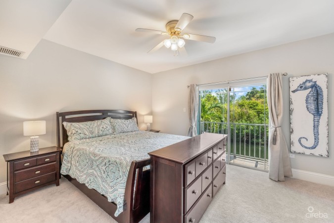 UPGRADED COASTAL ESCAPE CANAL FRONT TOWNHOUSE