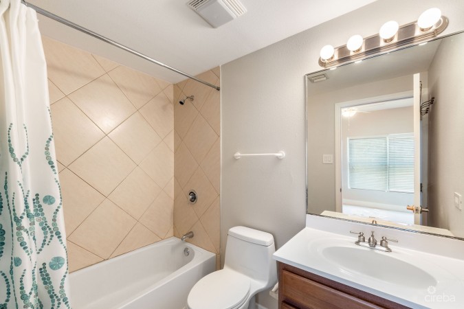 UPGRADED COASTAL ESCAPE CANAL FRONT TOWNHOUSE