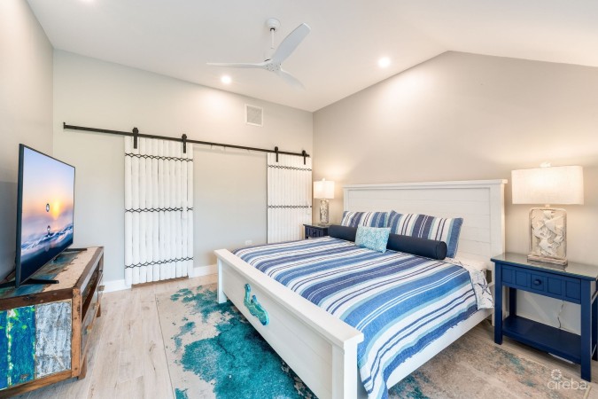UPGRADED COASTAL ESCAPE CANAL FRONT TOWNHOUSE