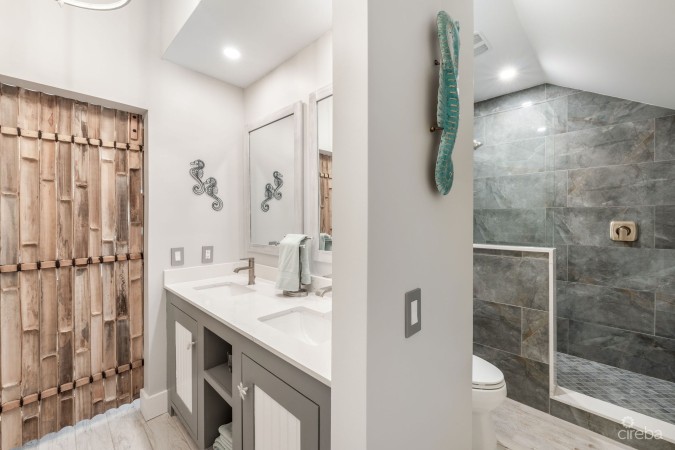 UPGRADED COASTAL ESCAPE CANAL FRONT TOWNHOUSE