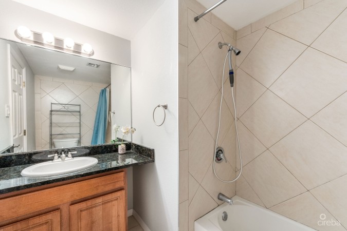 UPGRADED COASTAL ESCAPE CANAL FRONT TOWNHOUSE