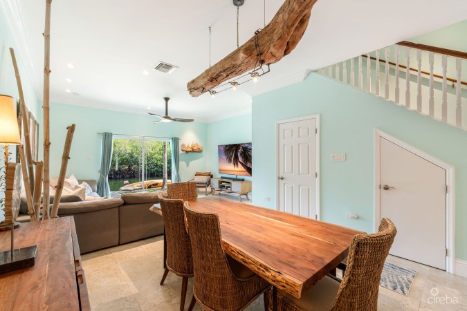 UPGRADED COASTAL ESCAPE CANAL FRONT TOWNHOUSE