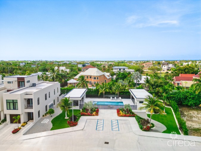 MODERN 2-BEDROOM + DEN TOWNHOME AT SALT AIR – GATED LIVING IN WEST BAY