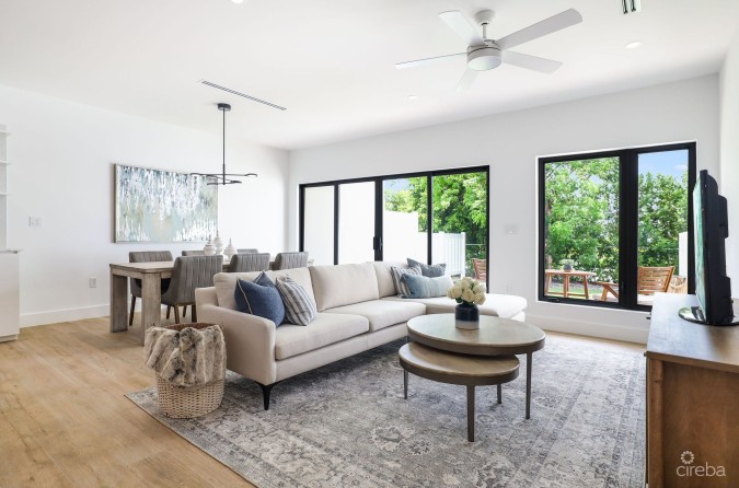 MODERN 2-BEDROOM + DEN TOWNHOME AT SALT AIR – GATED LIVING IN WEST BAY