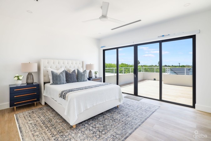 MODERN 2-BEDROOM + DEN TOWNHOME AT SALT AIR – GATED LIVING IN WEST BAY