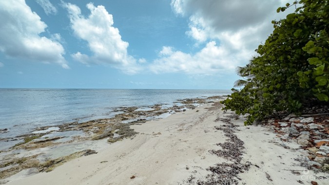 LITTLE CAYMAN OCEAN VIEW RESIDENTIAL HOME WITH BEACHFRONT LOT