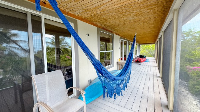 LITTLE CAYMAN OCEAN VIEW RESIDENTIAL HOME WITH BEACHFRONT LOT