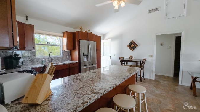 LITTLE CAYMAN OCEAN VIEW RESIDENTIAL HOME WITH BEACHFRONT LOT