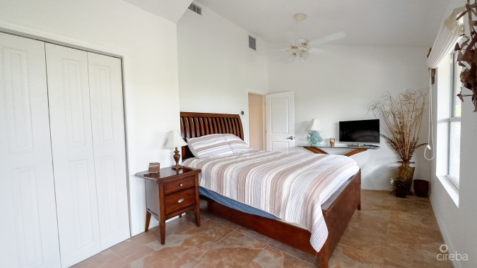 LITTLE CAYMAN OCEAN VIEW RESIDENTIAL HOME WITH BEACHFRONT LOT