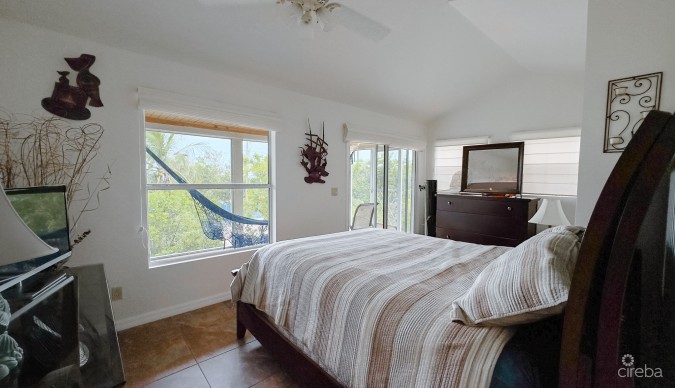 LITTLE CAYMAN OCEAN VIEW RESIDENTIAL HOME WITH BEACHFRONT LOT