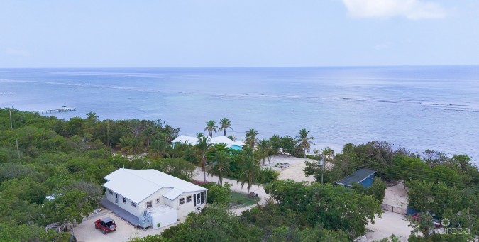 LITTLE CAYMAN OCEAN VIEW RESIDENTIAL HOME WITH BEACHFRONT LOT