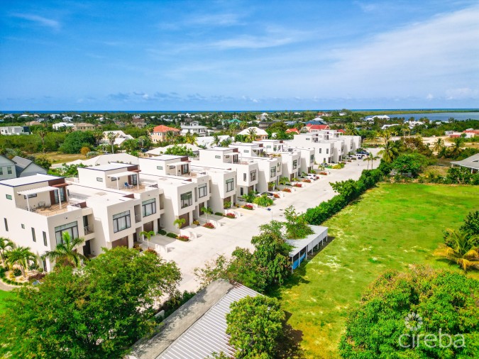 MODERN 2-BEDROOM + DEN TOWNHOME IN SALT AIR | GATED LIVING IN WEST BAY