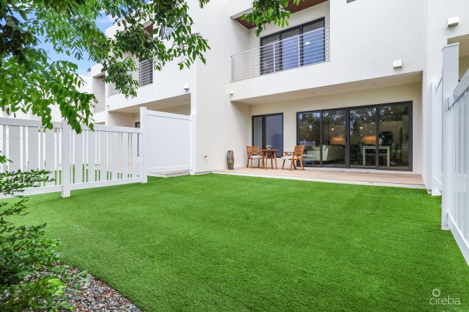MODERN 2-BEDROOM + DEN TOWNHOME IN SALT AIR | GATED LIVING IN WEST BAY