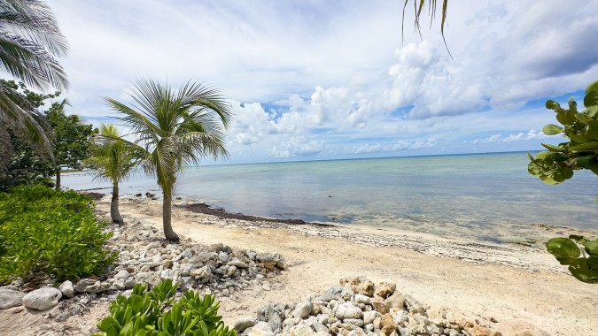 LITTLE CAYMAN OCEAN VIEW RESIDENTIAL HOME WITH BEACHFRONT LOT