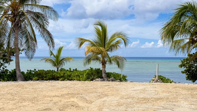 LITTLE CAYMAN OCEAN VIEW RESIDENTIAL HOME WITH BEACHFRONT LOT