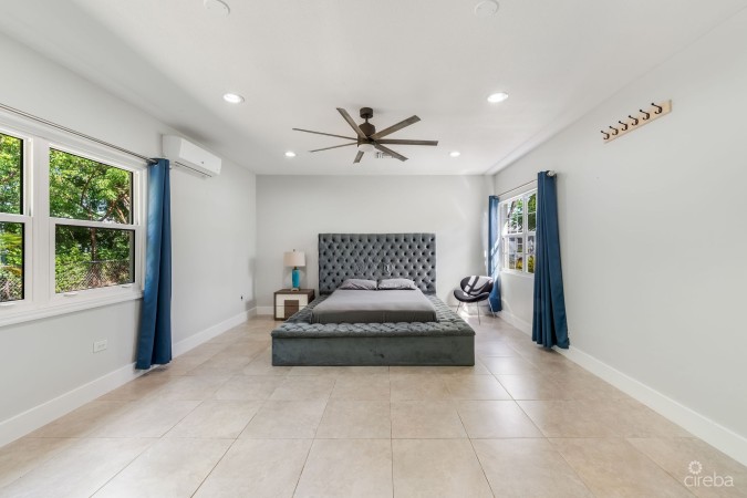 SPACIOUS 4-BEDROOM HOME IN TROPICAL GARDENS