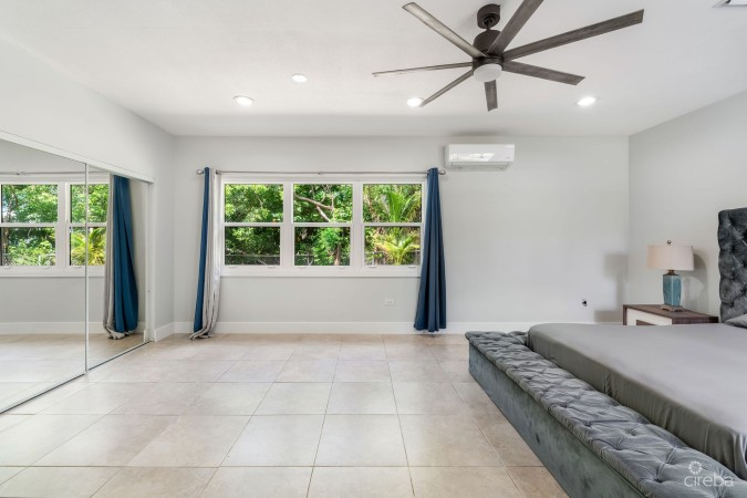 SPACIOUS 4-BEDROOM HOME IN TROPICAL GARDENS