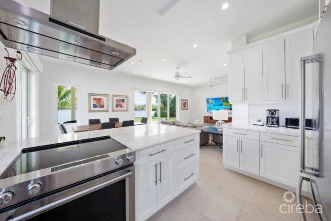 UNIQUE PATRICK'S ISLAND CANALFRONT W GUEST HOUSE | 3 CAR GARAGE