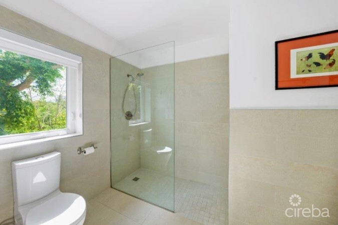 UNIQUE PATRICK'S ISLAND CANALFRONT W GUEST HOUSE | 3 CAR GARAGE