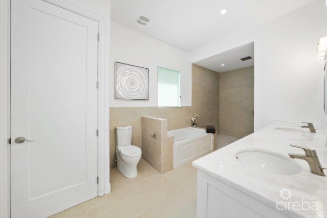 UNIQUE PATRICK'S ISLAND CANALFRONT W GUEST HOUSE | 3 CAR GARAGE