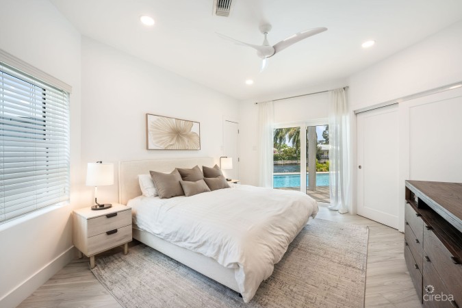 LATITUDE - CANAL FRONT LIVING IN GOVERNOR’S HARBOUR