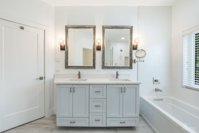 LATITUDE - CANAL FRONT LIVING IN GOVERNOR’S HARBOUR