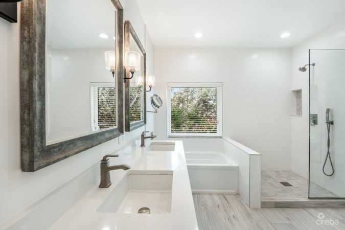 LATITUDE - CANAL FRONT LIVING IN GOVERNOR’S HARBOUR